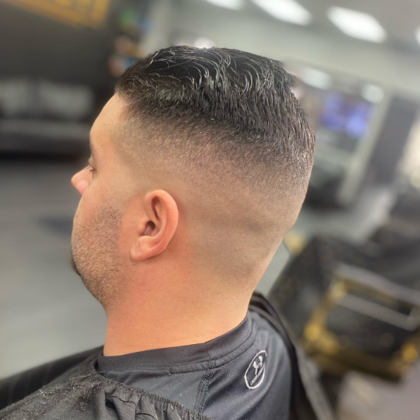 Clean classic fade finished by E the Barber